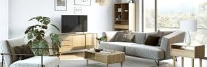 modern livingroom with grey couch and grey chair and sidetables
