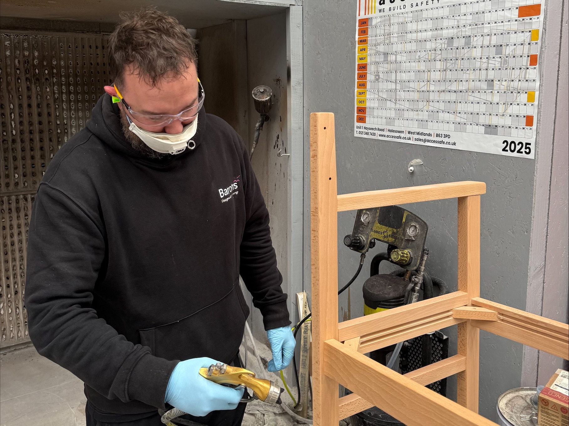 Man spraying chair